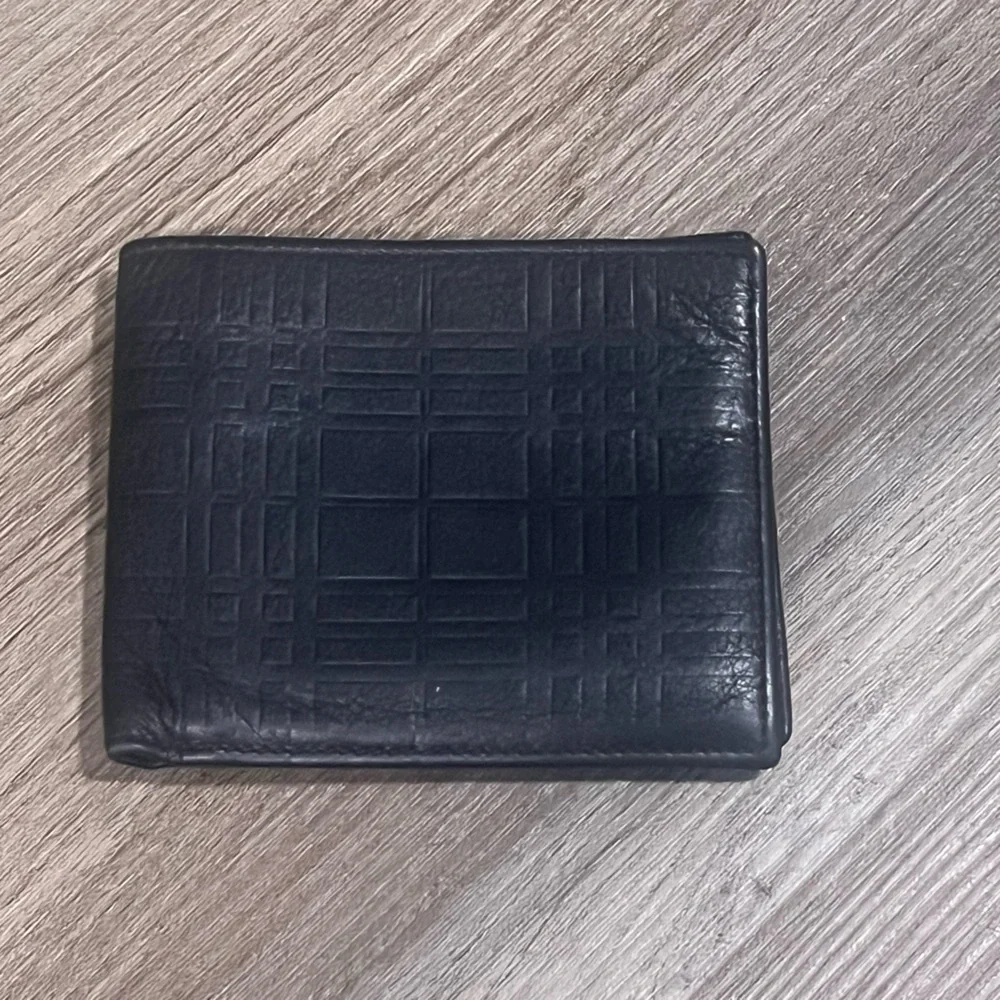 Burberry Embosses Check Bifold Leather Wallet in Black